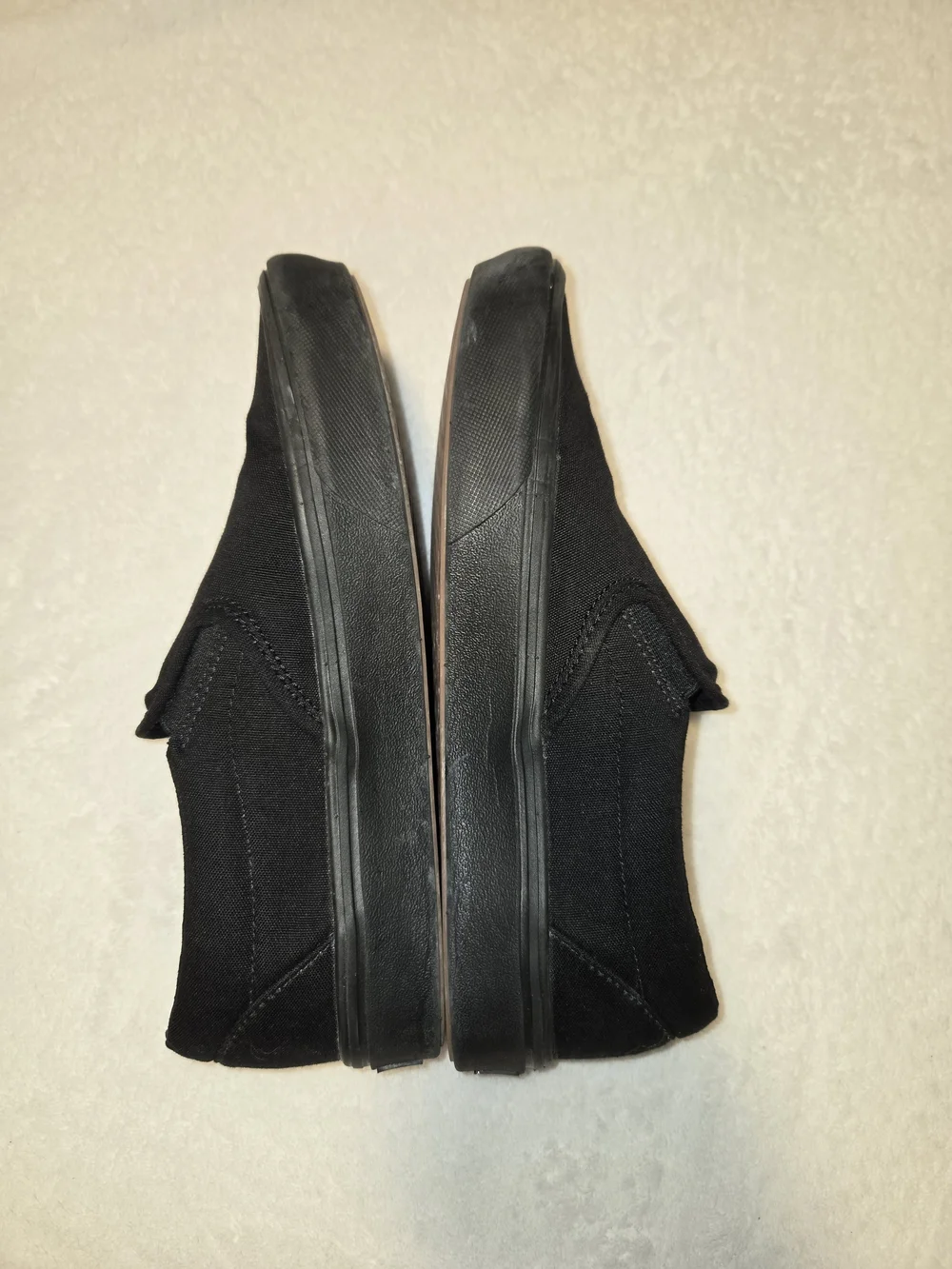 Vans Classic Slip-On Sneakers in Black